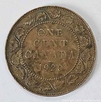 Reverse side showing ONE CENT CANADA 1920 with maple leaf wreath