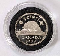 Obverse view of 1989 Canada 5-cent proof coin in capsule