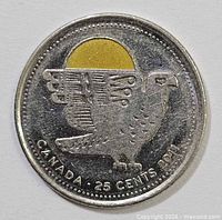 Reverse showing Peregrine Falcon design with coloured sun