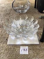 Top view of clear glass bowl with nautilus shell pattern