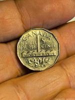 Reverse of 1951 Canadian 5 cents nickel commemorative coin