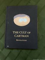 Front of slipcover showing title and Cartman graphic