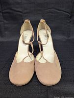 Front view of Prada blush suede T-strap heels