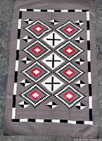 Full view of geometric Southwestern wool rug