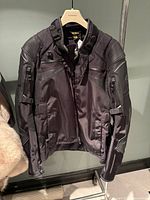 Full front view of Scorpion EXO jacket on hanger