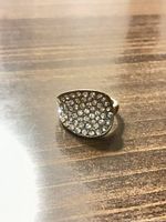 Front view of ring showing pavé rhinestones and overall shape
