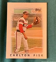 Front of 1986 Topps Carlton Fisk card showing action image and player name