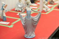 Front view of figurine showing full figure and dress detail