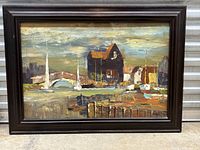 Front view framed seaside painting