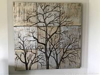 Front view of 35.5 x 35.5 inch square wall art featuring tree branches in bronze and platinum colors.