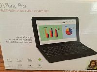 Front of retail box showing tablet with keyboard and feature callouts