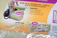 Close-up photo showing packaging details of a Jumbo Vacuum Seal Space Saver Tote highlighting capacity to hold bedding, pillows, sweaters or jackets and features such as airtight zipper and patented one-way valve.