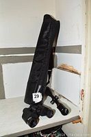 Leapers rifle scope and Kodak binoculars with carrying case.