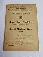 Front cover of 1939 Canadian Small Arms Training pamphlet for Light Machine Gun, showing title, publication details, and inscription at top.