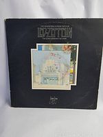 Front view of vintage Led Zeppelin The Song Remains The Same double LP vinyl album cover showing artwork and title.