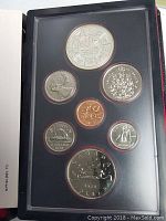 Complete set of seven Canadian coins in clear sealed protective case inside presentation folder