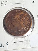 Front side (obverse) of the 1845 USA Large Cent Penny showing Liberty head and date, housed in cardboard holder.