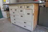 Front-left angle showing entire base cabinet and tabletop on top