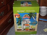Front of sealed retail box showing Key West Frozen Concoction Maker branding