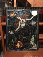 Full view of stained glass mermaid panel showing mermaid, fish, seagrass, and moon.