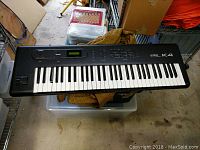 Full view of Kawai K4 keyboard synthesizer showing keys and overall design.