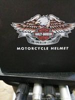 Close up of Harley Davidson logo on box with eagle and 'An American Legend' text