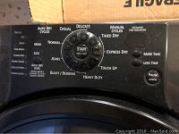 Close up of the dryer control panel showing multiple cycle options and start button.