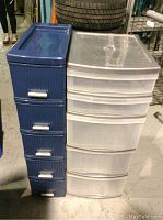 Two sets of plastic drawer units side-by-side. Left set is blue with silver handles, right set is translucent white plastic.