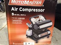 Box art showing Motomaster Air Compressor details