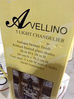 Label showing brand Avellino and description of 5-Light Chandelier including dimensions and bulb specifications.