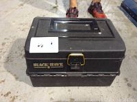 Closed Black Hawk fishing tackle box with handle on top and latch in front