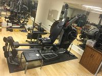 Full view of Bowflex bench, SpiraFlex console, attachments and floor mat