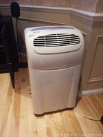 Front view showing unit housing and grille