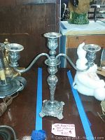 Front view of William Rodgers and Sons 1915 Victorian Rose candelabra with three candle holders and ornate floral detailing.