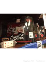 Photo of the 1930 Ford Model A Coca Cola die-cast truck with a close-up of the dice and pricing sticker.