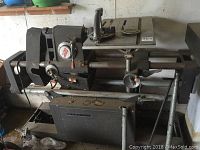 Full side view of Shop Smith Mark IV saw and lathe combo with saw table and lathe components visible.