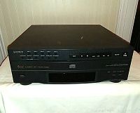 Front view of Sony 5 disc CD player showing control buttons, Sony branding, and disc loading system.
