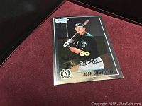 Josh Donaldson baseball card showing full player image and facsimile autograph in plastic sleeve.
