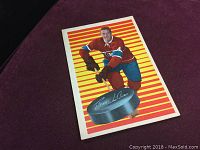 Front side of the 1963 Parkhurst Jean Beliveau hockey card showing player image and background.