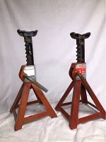 Pair of Motomaster 2 ton axle stands showing front view with both items and their structural details
