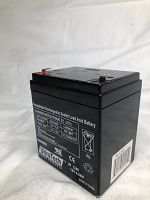 Front and side view of black UltraTech rechargeable sealed lead acid battery showing label with specs and terminals on top.