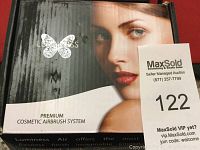 Box of Luminess Premium Cosmetic Airbrush System showing branding and packaging