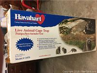 Photo of box showing Havahart branding and cage trap image with model 1079 and usage information