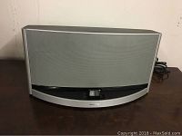 Front view of the Bose SoundDock speaker dock showing the speaker grill and the integrated docking station at front.