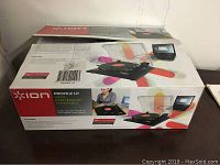 Original box for the Ion Profile LP vinyl conversion turntable showing product features and branding.