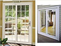 Interior view of white vinyl sliding patio door with grid-patterned glass panels