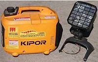Yellow Kipor IG2000P inverter generator with separate 500W spotlight on stand