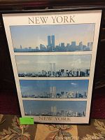 Framed poster with four panoramic images of New York City including the Twin Towers with 'NEW YORK' text at top and bottom.