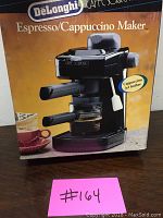Front of box showing DeLonghi Caffe Sorrento Espresso/Cappuccino Maker image and branding
