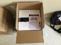 Open box showing the boxed Temp-tations 16 piece Old World dinnerware set inside with protective foam.